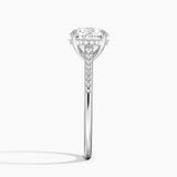 Lissome Half-Coverage Diamond Engagement Ring with a Round cut diamond in white gold — profile view
