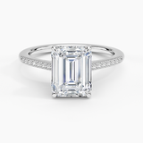 Lissome Half-Coverage Diamond Engagement Ring with a Emerald cut diamond in white gold — top view