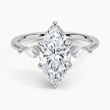 Cometa Three Stone Diamond Engagement Ring with a Marquise cut diamond in white gold — top view