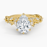 Secret Garden Diamond Engagement Ring with a Pear cut diamond in yellow gold — top view