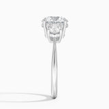 Luxe Selene Three Stone Diamond Engagement Ring with a Round cut diamond in white gold — profile view