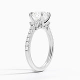 Amelie Three Stone Diamond Engagement Ring with a Round cut diamond in white gold — side view