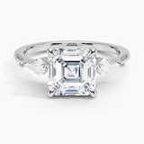 Luxe Cometa Three Stone Diamond Engagement Ring with a Asscher cut diamond in white gold — top view