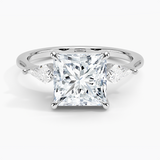 Luxe Cometa Three Stone Diamond Engagement Ring with a Princess cut diamond in white gold — top view