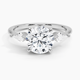 Luxe Cometa Three Stone Diamond Engagement Ring with a Round cut diamond in white gold — top view