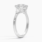 Petite Opera Three Stone Diamond Engagement Ring with a Round cut diamond in white gold — side view