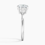 Petite Opera Three Stone Diamond Engagement Ring with a Round cut diamond in white gold — profile view