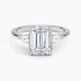 Petite Opera Three Stone Diamond Engagement Ring with a Emerald cut diamond in white gold — top view