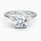 Adorned Petite Opera Three Stone Diamond Engagement Ring with a Radiant cut diamond in white gold — top view
