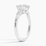 Symphony Three Stone Diamond Engagement Ring with a Round cut diamond in white gold — side view