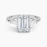 Symphony Three Stone Diamond Engagement Ring with a Emerald cut diamond in white gold — top view