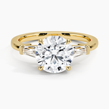 Symphony Three Stone Diamond Engagement Ring with a Round cut diamond in yellow gold — top view