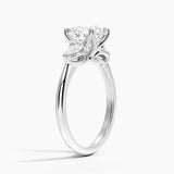 Fleur Three Stone Diamond Engagement Ring with a Round cut diamond in white gold — side view