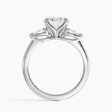 Fleur Three Stone Diamond Engagement Ring with a Round cut diamond in white gold — profile view