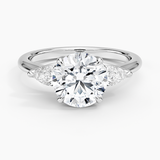 Fleur Three Stone Diamond Engagement Ring with a Round cut diamond in white gold — top view