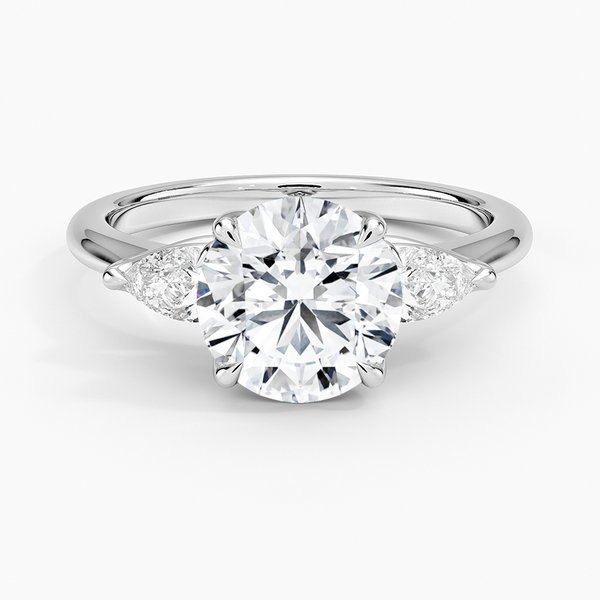 Fleur Three Stone Diamond Engagement Ring with a Round cut diamond in white gold — top view