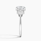 Luxe Opera Three Stone Diamond Engagement Ring with a Round cut diamond in white gold — profile view