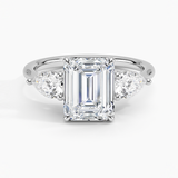 Luxe Opera Three Stone Diamond Engagement Ring with a Emerald cut diamond in white gold — top view
