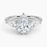 Luxe Opera Three Stone Diamond Engagement Ring with a Pear cut diamond in white gold — top view