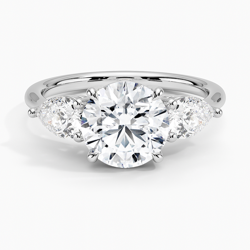 Luxe Opera Three Stone Diamond Engagement Ring with a Round cut diamond in white gold — top view
