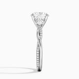 Petite Twisted Vine Three Stone Diamond Engagement Ring with a Round cut diamond in white gold — profile view