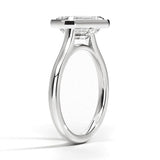Luna East-West Bezel Solitaire Engagement Ring with a Emerald cut diamond in white gold — side view