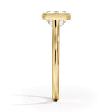 Luna East-West Bezel Solitaire Engagement Ring with a Emerald cut diamond in white gold — profile view