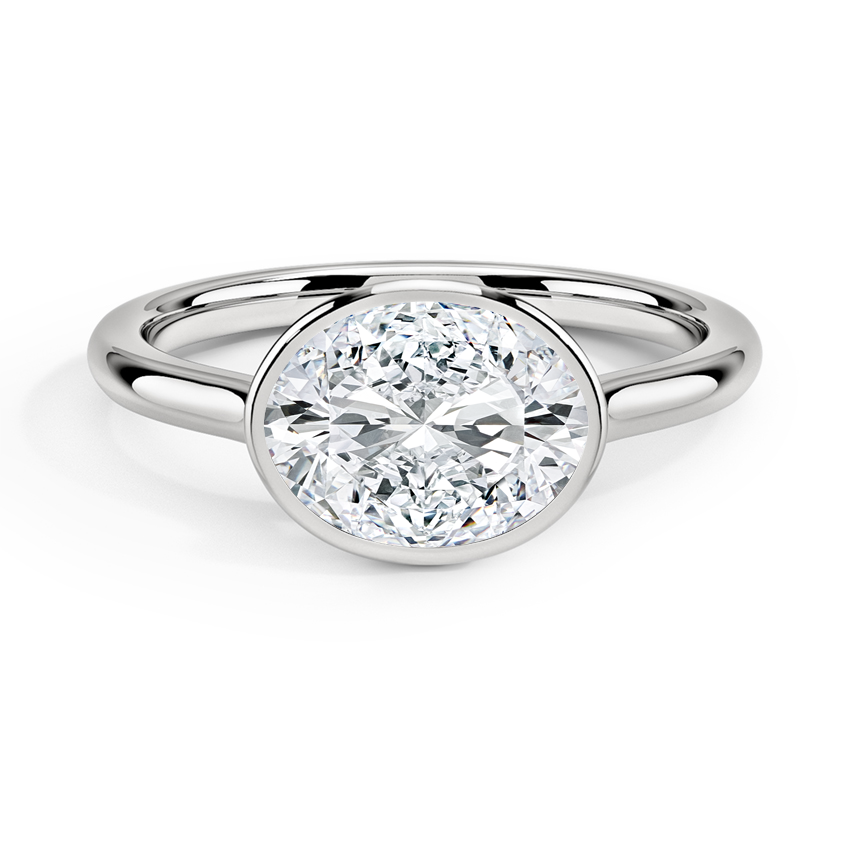 Luna East-West Bezel Solitaire Engagement Ring with a Oval cut diamond in white gold