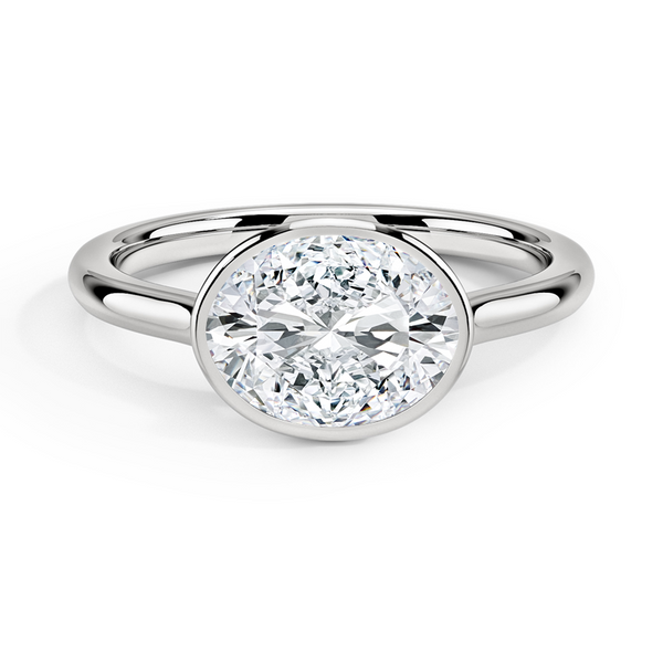 Luna East-West Bezel Solitaire Engagement Ring with a Oval cut diamond in white gold