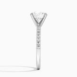 Petite Shared Prong Half Coverage Diamond Engagement Ring with a Round cut diamond in white gold — profile view