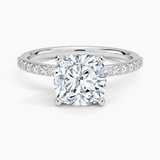 Petite Shared Prong Half Coverage Diamond Engagement Ring with a Cushion cut diamond in white gold — top view