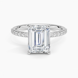 Petite Shared Prong Half Coverage Diamond Engagement Ring with a Emerald cut diamond in white gold — top view