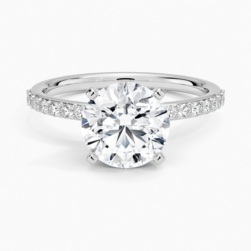 Petite Shared Prong Half Coverage Diamond Engagement Ring with a Round cut diamond in white gold — top view