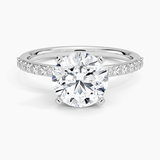 Petite Shared Prong Half Coverage Diamond Engagement Ring with a Round cut diamond in white gold — top view