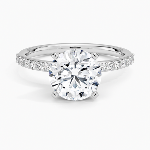 Petite Shared Prong Half Coverage Diamond Engagement Ring with a Round cut diamond in white gold — top view