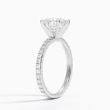 Petite Shared Prong Three-Quarter Coverage Diamond Engagement Ring with a Round cut diamond in white gold — side view
