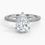 Petite Shared Prong Three-Quarter Coverage Diamond Engagement Ring with a Pear cut diamond in white gold — top view