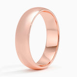 Comfort Fit 5.5mm Wedding Ring in rose gold — side view