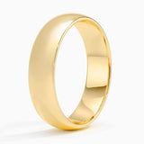 Comfort Fit 5.5mm Wedding Ring in yellow gold — side view