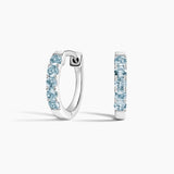 Soiree Aquamarine Huggie Earrings in white gold — top view
