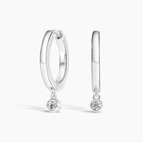 Diamond Drop Huggie Earrings in white gold — top view