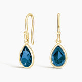 Teardrop London Blue Topaz Earrings in yellow gold — top view