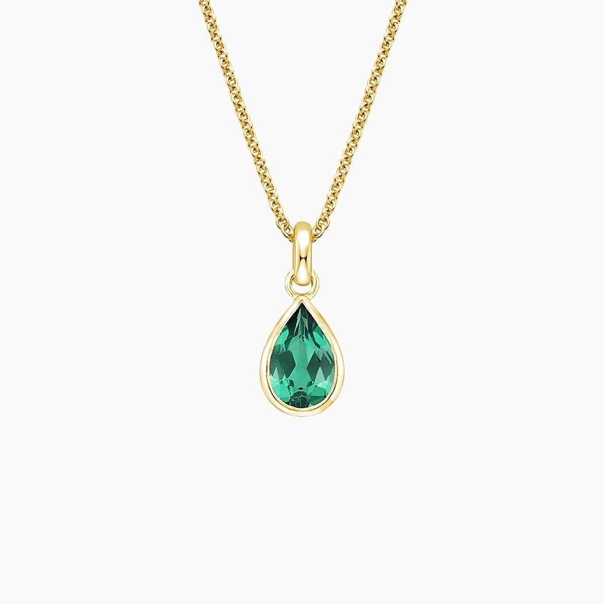Teardrop Lab Emerald Pendant in yellow gold — top view