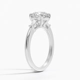 Tapered Baguette Three Stone Diamond Engagement Ring with a Round cut diamond in white gold — side view