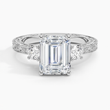 Antique Scroll Three Stone Trellis Diamond Engagement Ring with a Emerald cut diamond in white gold — top view