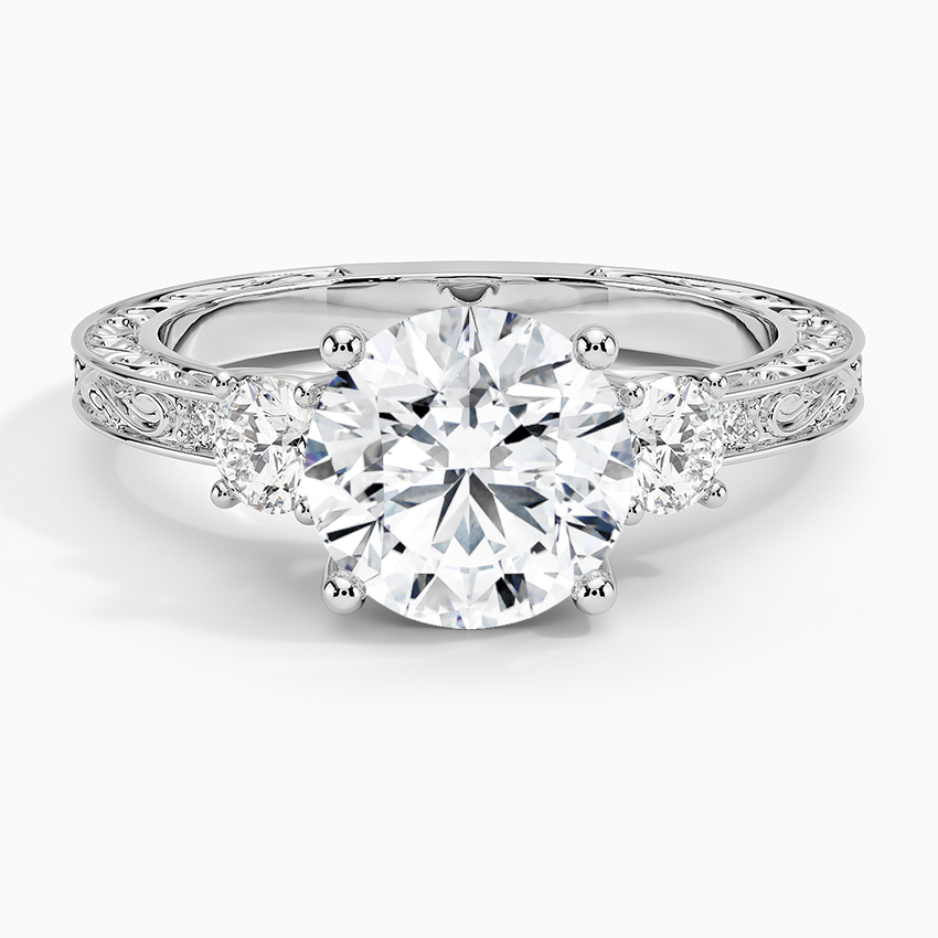 Antique Scroll Three Stone Trellis Diamond Engagement Ring with a Round cut diamond in white gold — top view