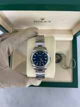 Rolex Oyster Perpetual 31mm Blue Dial Smooth Bezel Stainless Steel Watch